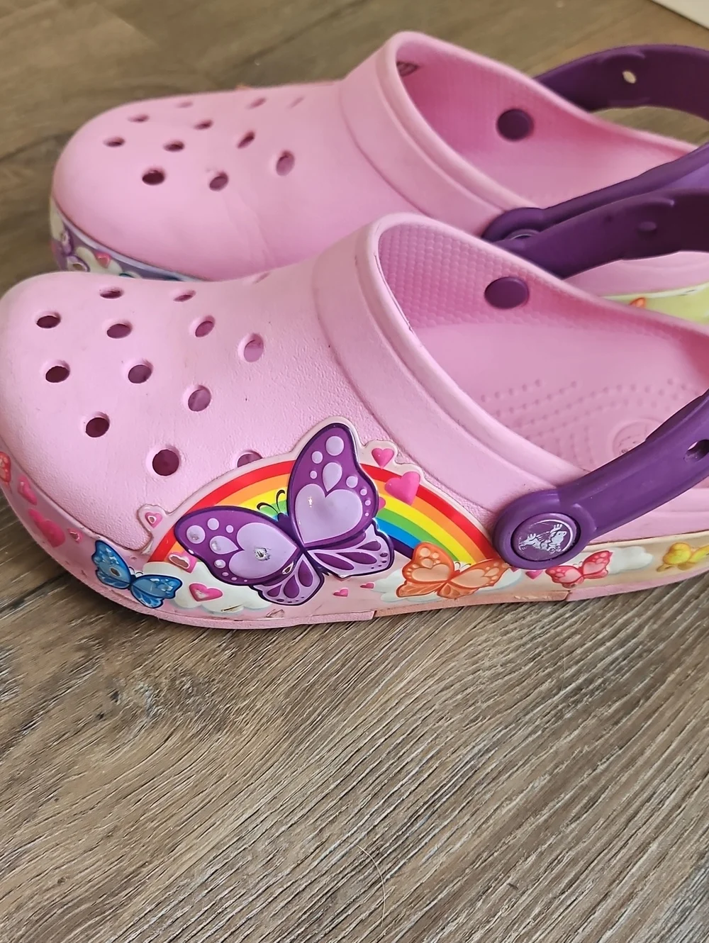 CROCS Pink Clog Sandals with Purple Heel Strap Rainbow and butterfly design